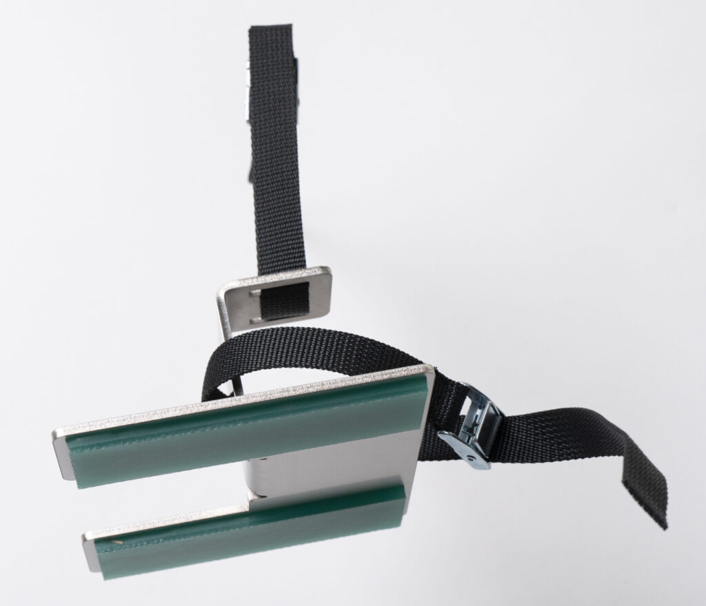 No need to drill holes—it’s secured with a seismic-resistant adhesive pads.