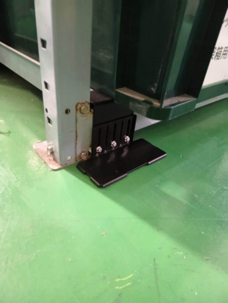Metal rack secured by Proseven Metal fitting preventing tipping over.